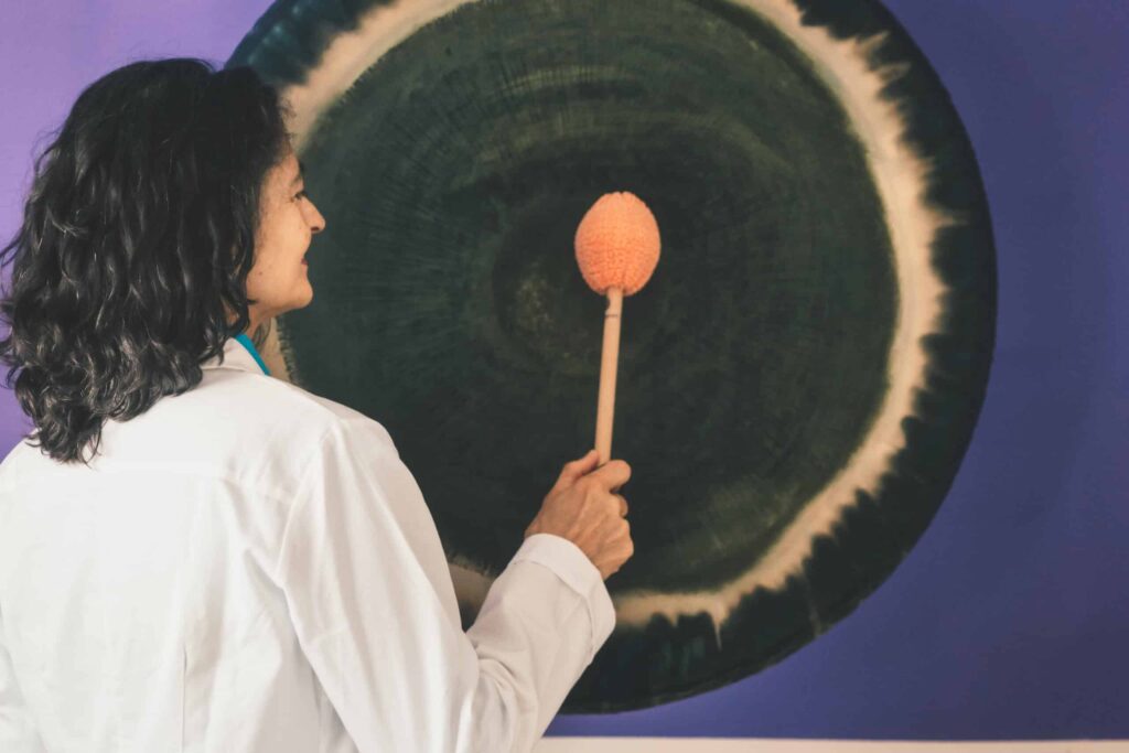 woman and gong