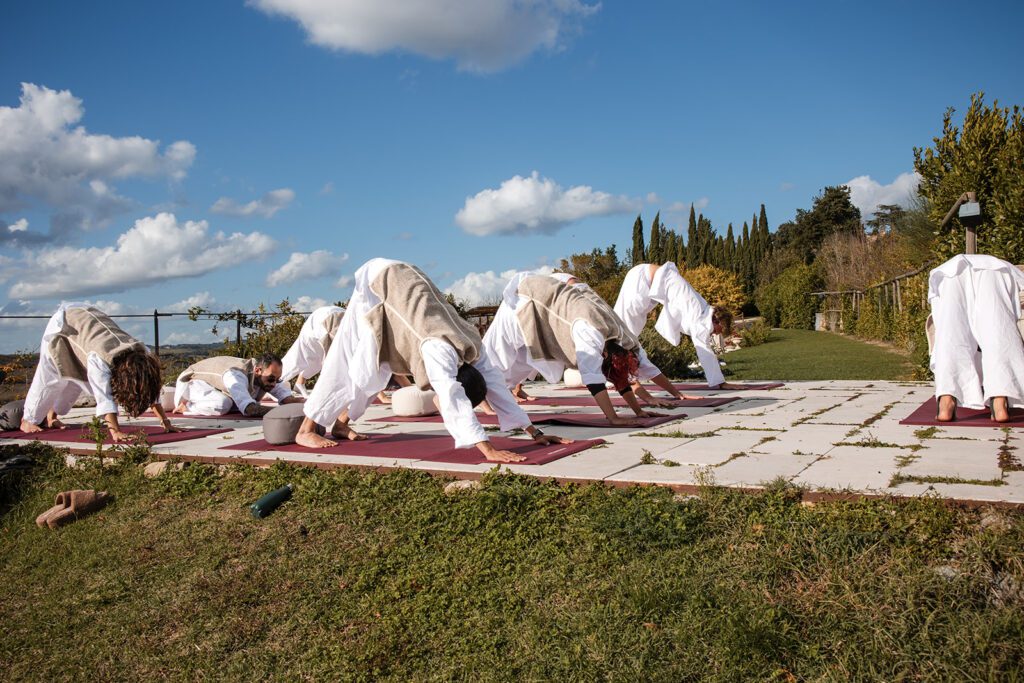 group doing yoga outside