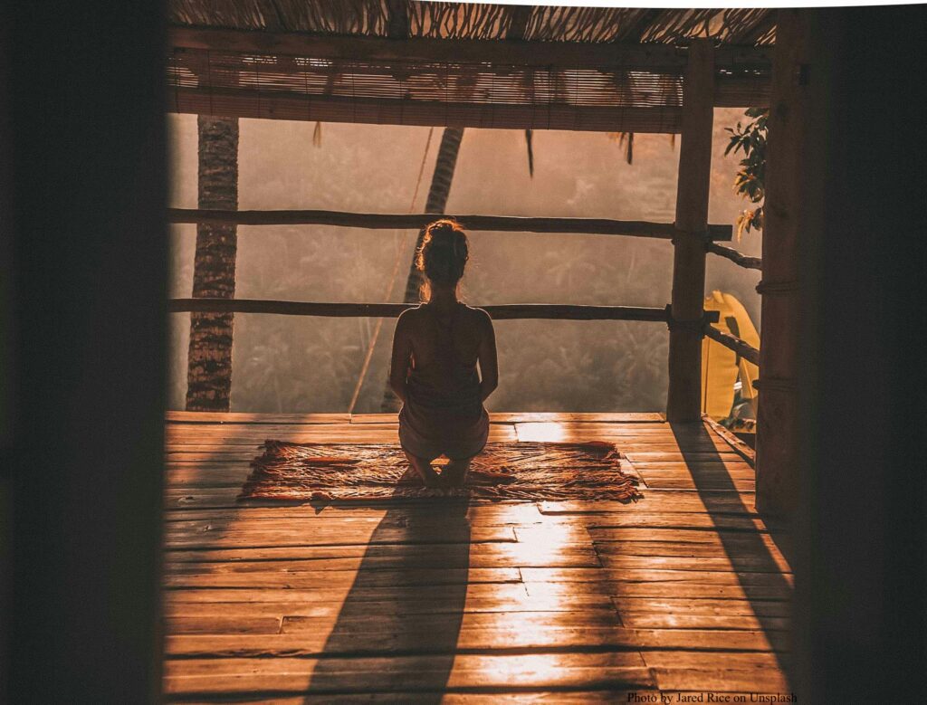 woman meditating in nature