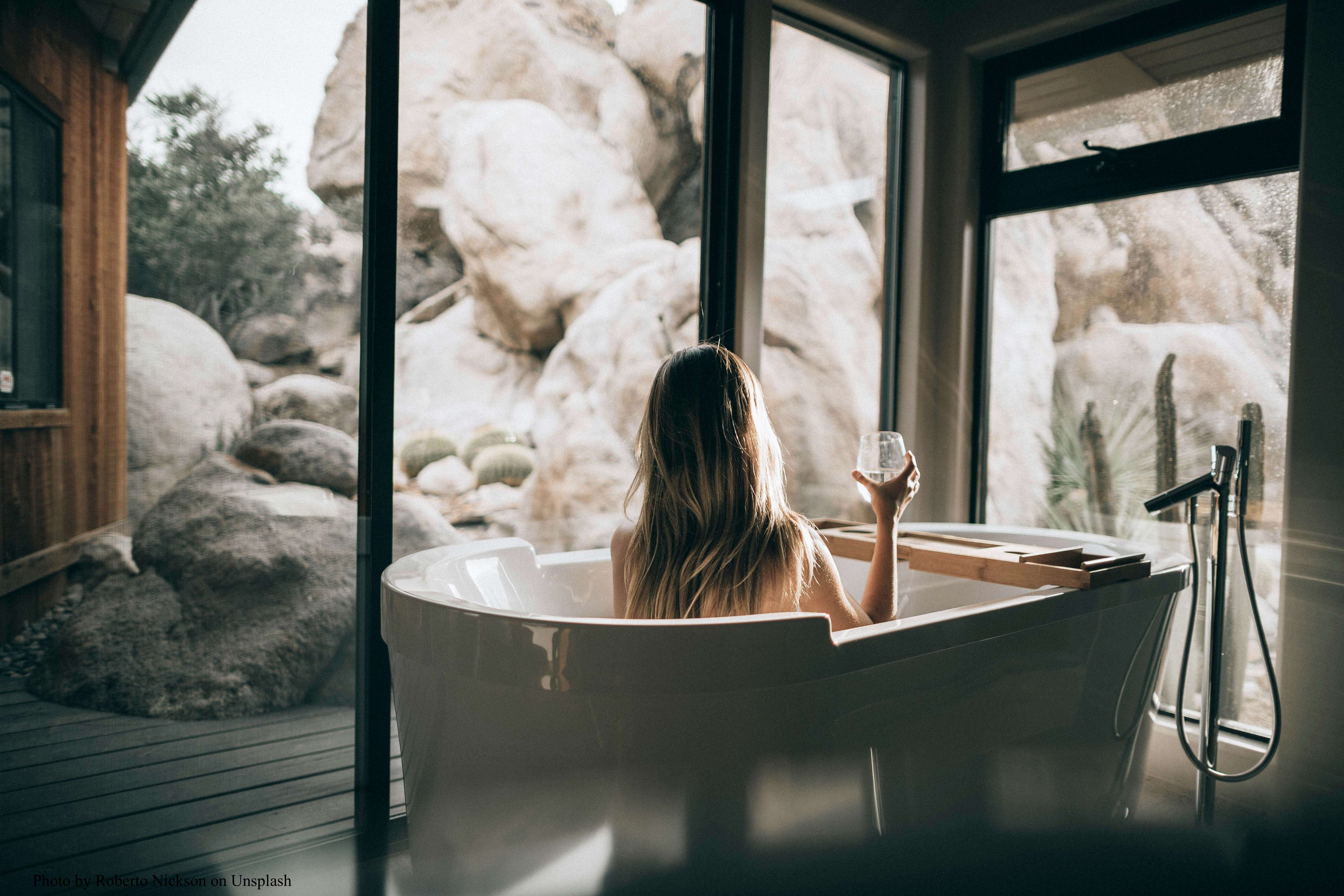 woman relaxing in a bathtub