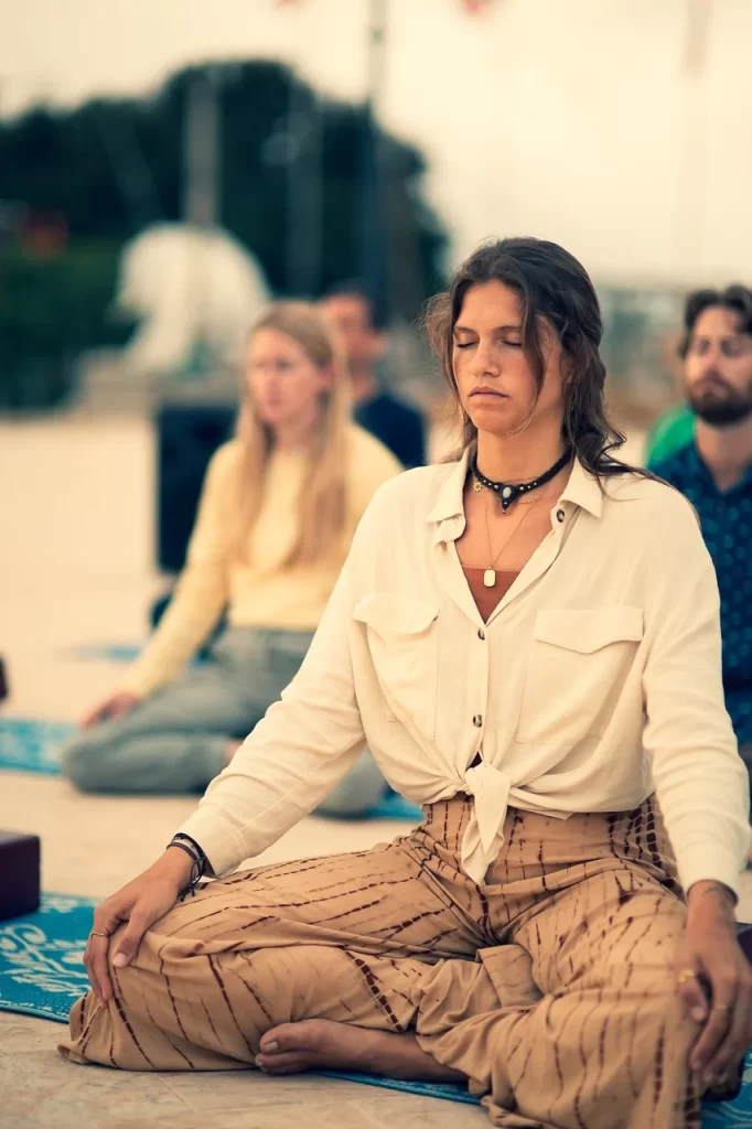 people meditating in group