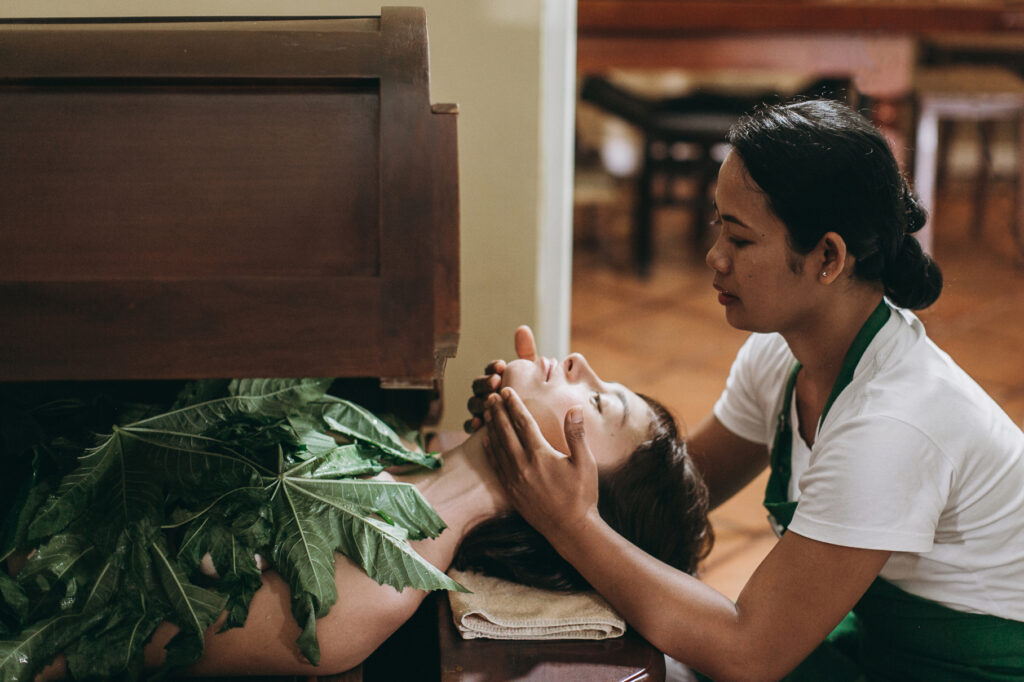 ayurvedic massage with leaves