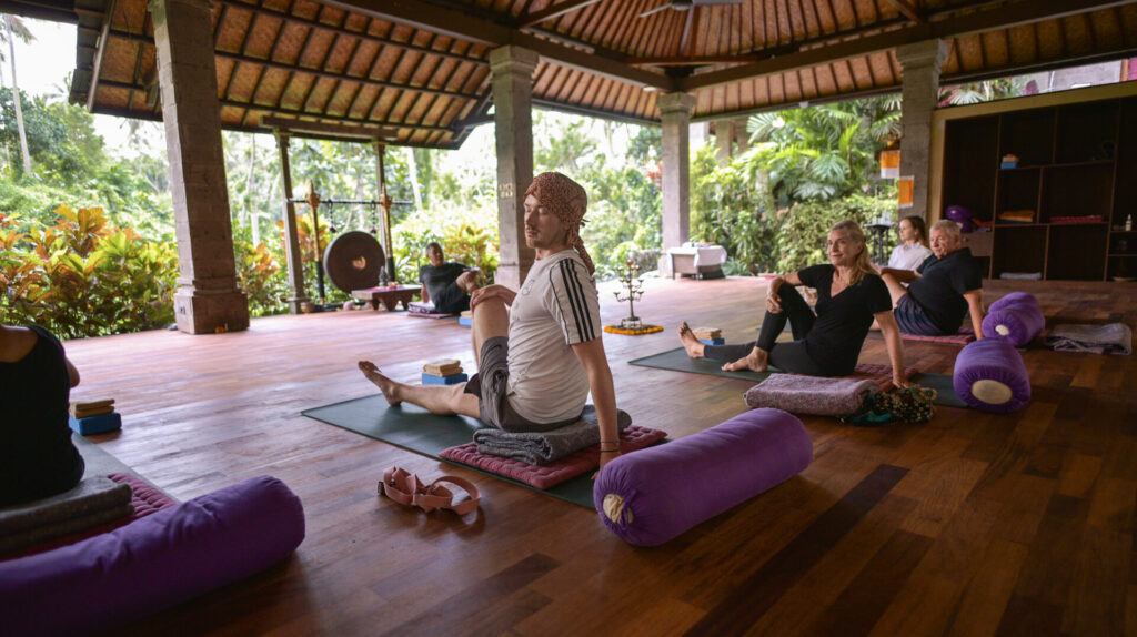 group of people doing yoga