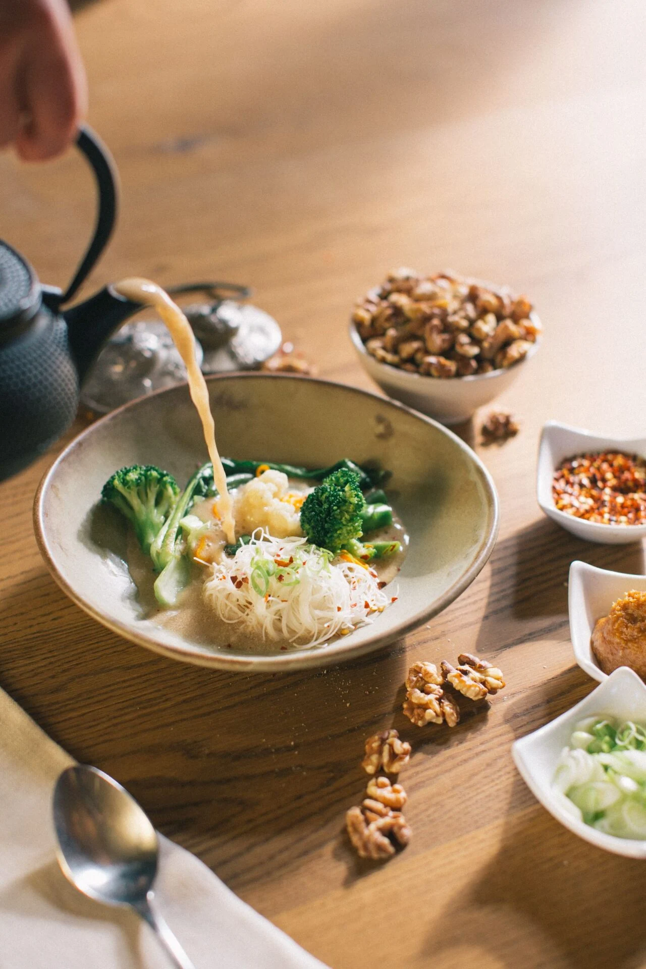 bowl of noodles and vegetables broth