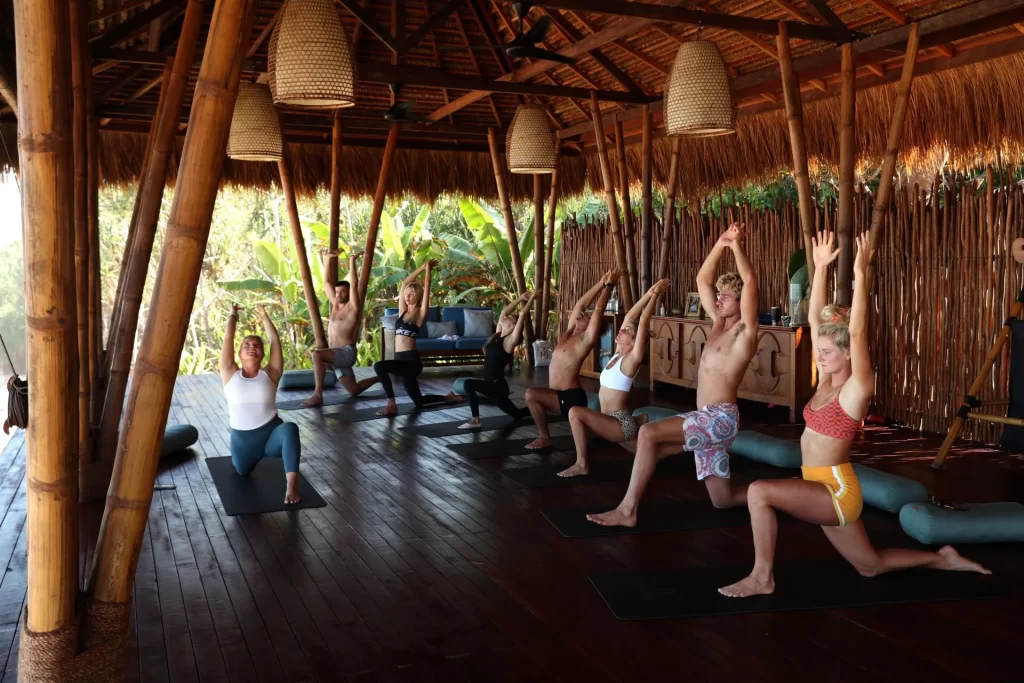 people doing yoga at nihi