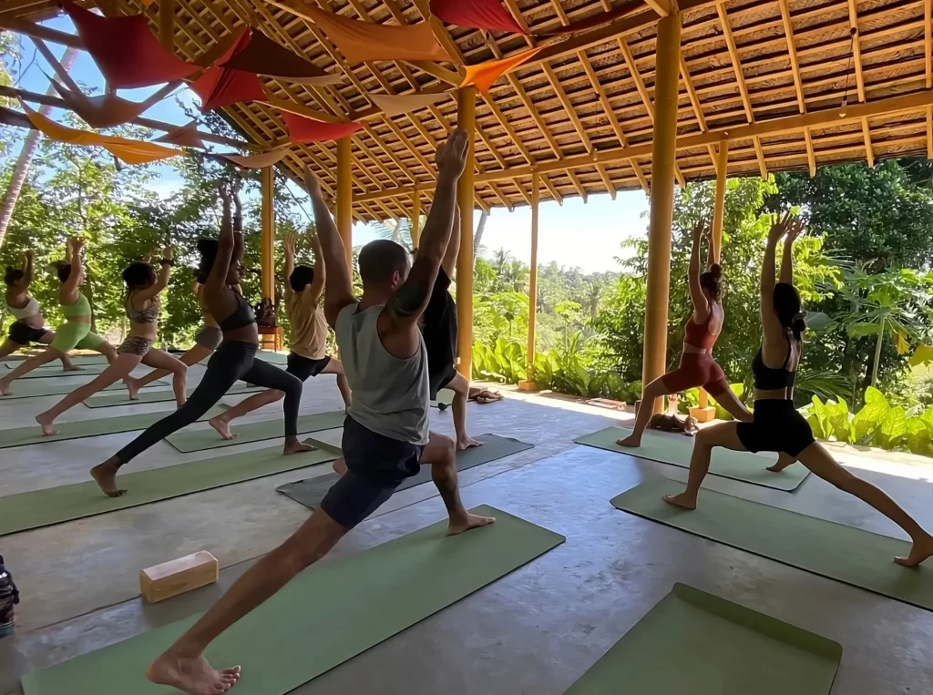 group of people doing yoga